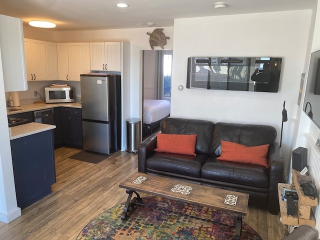 living room with dark wood-type flooring