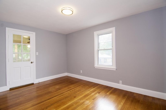 63 Grandview St, Springfield, MA 01118 - unfurnished room featuring plenty of natural light, baseboards, and wood finished floors