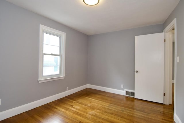 63 Grandview St, Springfield, MA 01118 - spare room featuring wood finished floors and baseboards
