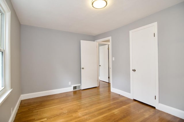 63 Grandview St, Springfield, MA 01118 - unfurnished bedroom with wood finished floors and baseboards