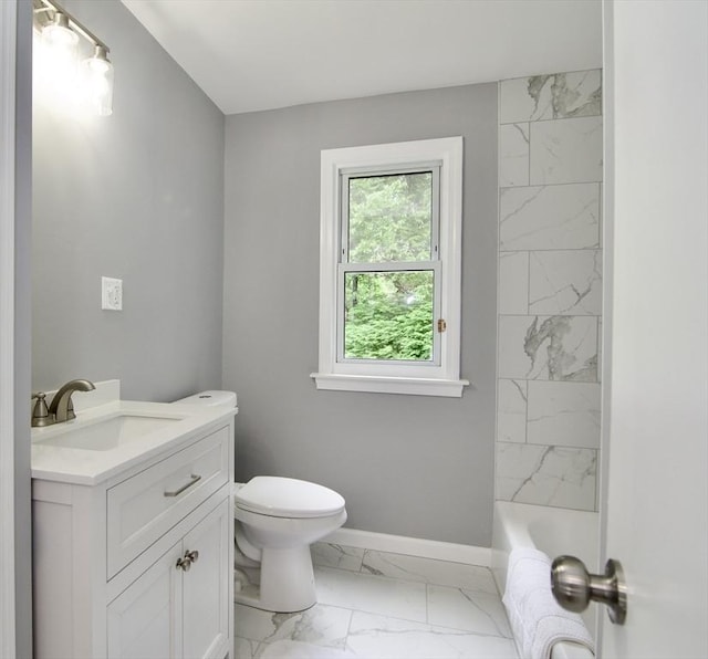 63 Grandview St, Springfield, MA 01118 - full bathroom featuring marble finish flooring, vanity, toilet, and baseboards