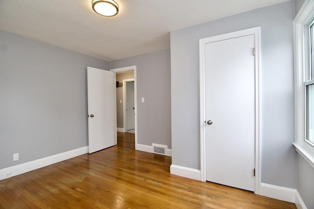 63 Grandview St, Springfield, MA 01118 - unfurnished bedroom with light wood-style floors and baseboards