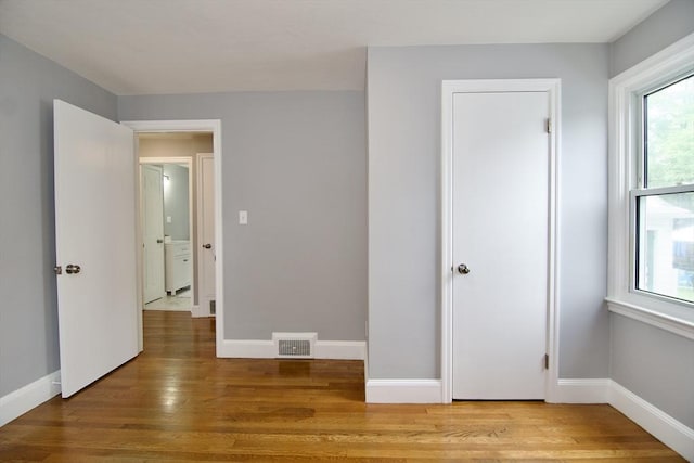 63 Grandview St, Springfield, MA 01118 - unfurnished bedroom with wood finished floors and baseboards