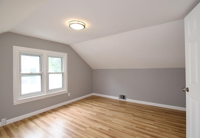 63 Grandview St, Springfield, MA 01118 - additional living space featuring light wood-type flooring, lofted ceiling, and baseboards
