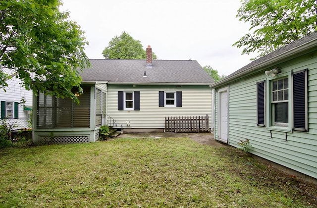 63 Grandview St, Springfield, MA 01118 - back of property featuring a chimney and entry steps