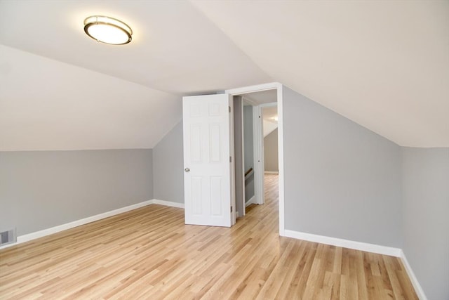 63 Grandview St, Springfield, MA 01118 - additional living space with wood finished floors, baseboards, and vaulted ceiling