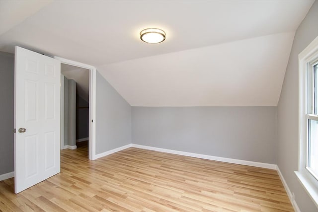 63 Grandview St, Springfield, MA 01118 - bonus room with light wood-type flooring, lofted ceiling, and baseboards