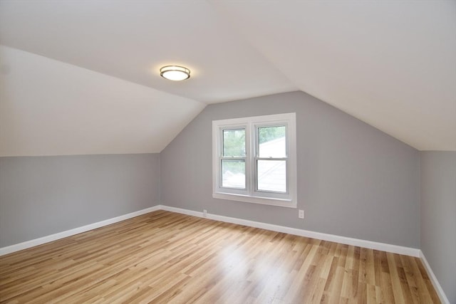 63 Grandview St, Springfield, MA 01118 - additional living space with wood finished floors, baseboards, and lofted ceiling