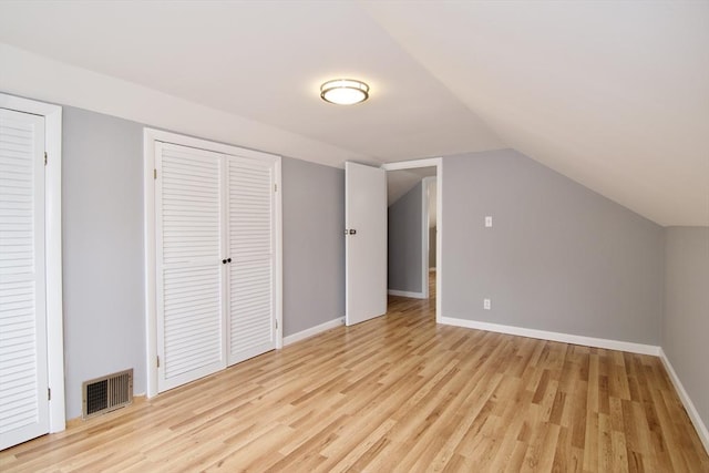 63 Grandview St, Springfield, MA 01118 - bonus room with light wood finished floors, lofted ceiling, and baseboards