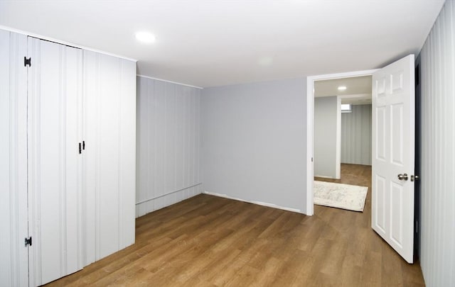 63 Grandview St, Springfield, MA 01118 - unfurnished bedroom with wood finished floors, a closet, recessed lighting, and baseboards
