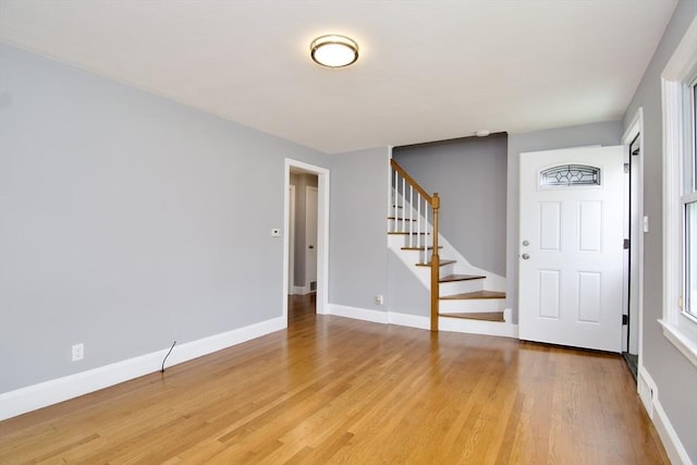 63 Grandview St, Springfield, MA 01118 - foyer entrance with stairs, light wood-style floors, and baseboards