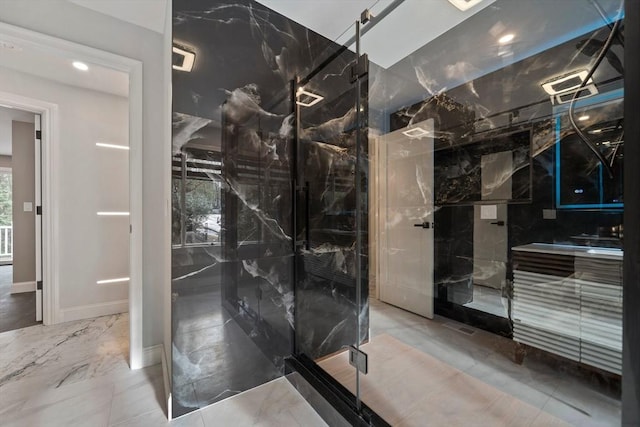 bathroom featuring an enclosed shower