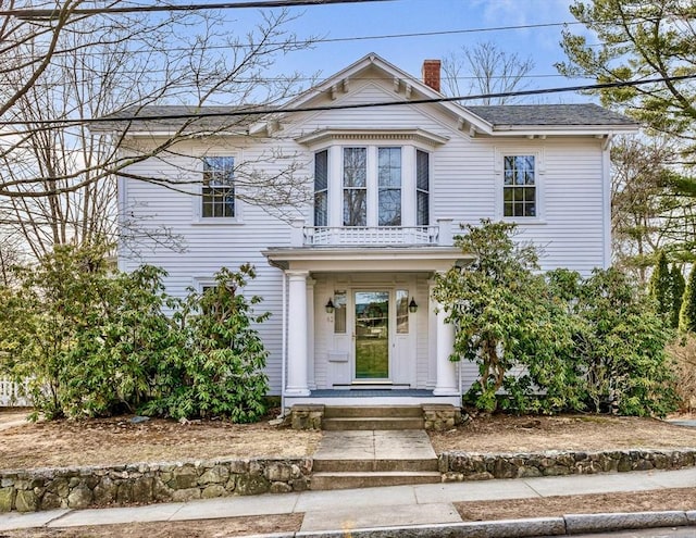 view of front of property featuring a chimney