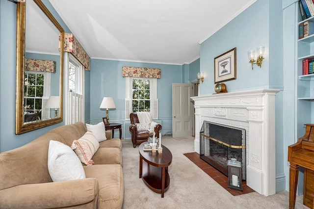 carpeted living area featuring a brick fireplace and ornamental molding