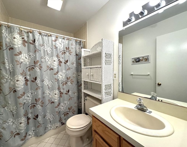 full bath featuring tile patterned flooring, a shower with curtain, toilet, and vanity