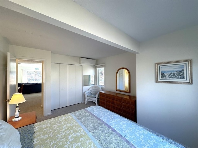 carpeted bedroom featuring a closet and a wall mounted air conditioner