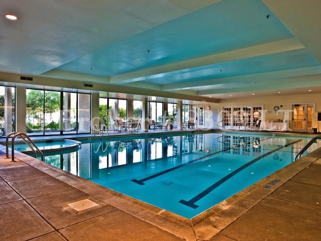 view of pool featuring a pool with connected hot tub