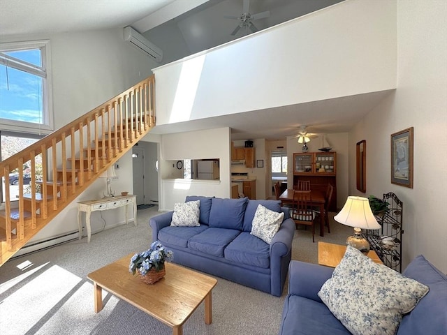 living area featuring high vaulted ceiling, a wall unit AC, carpet, ceiling fan, and stairs