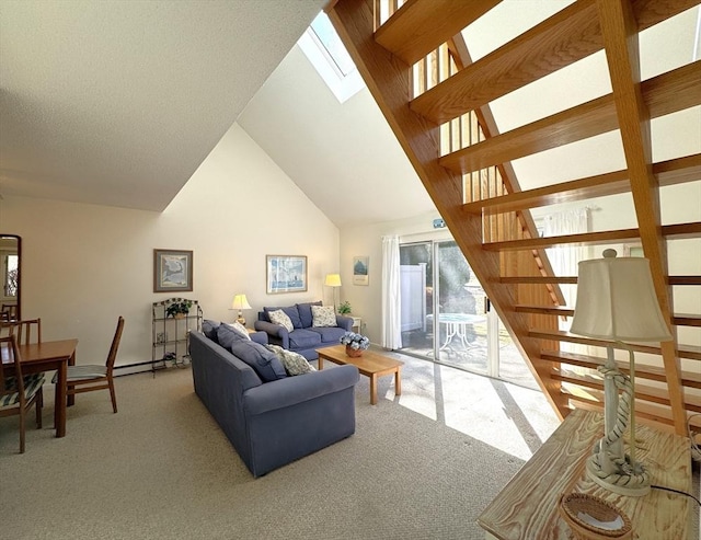 living room with light carpet, stairway, a skylight, and high vaulted ceiling