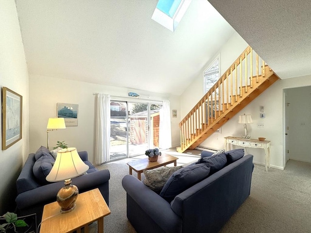 carpeted living area with stairway, lofted ceiling with skylight, a textured ceiling, and baseboards