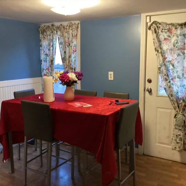 dining area with hardwood / wood-style floors