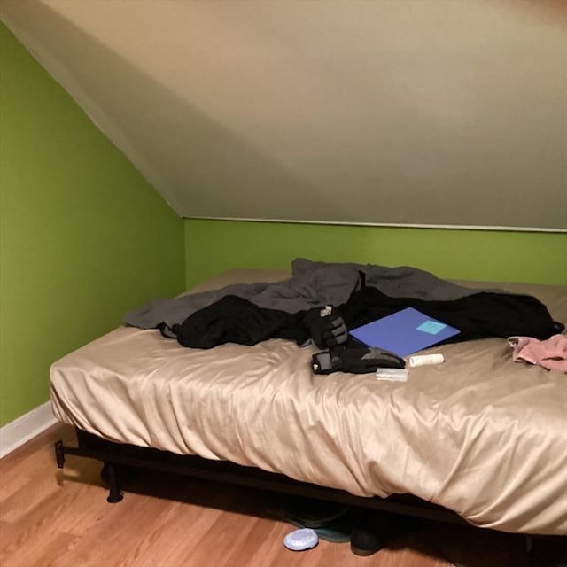 bedroom featuring hardwood / wood-style floors