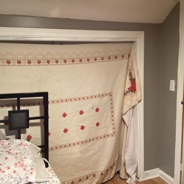 bedroom featuring hardwood / wood-style flooring