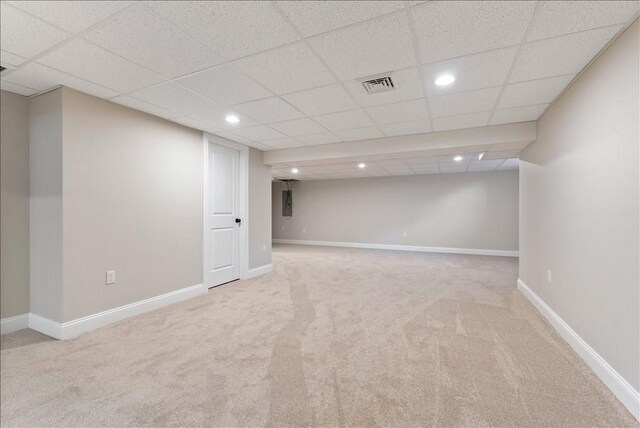 basement with light colored carpet