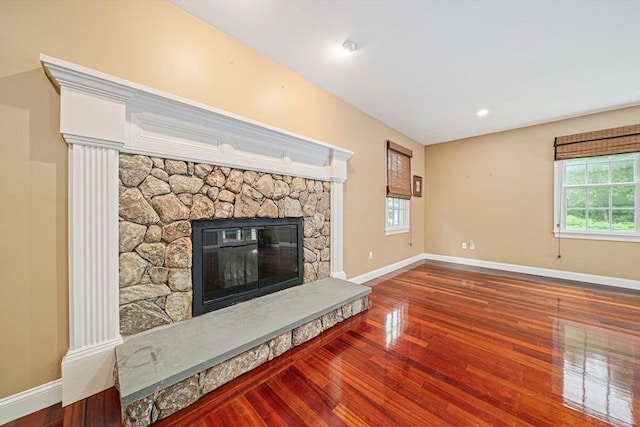6 Northey Farm Rd, Scituate, MA 02066 - unfurnished living room featuring wood finished floors and a fireplace