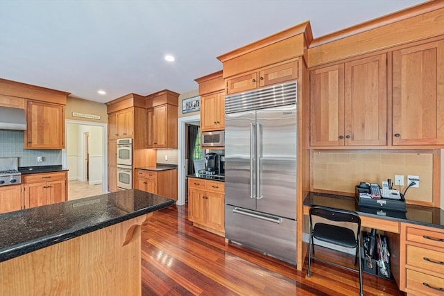 6 Northey Farm Rd, Scituate, MA 02066 - kitchen featuring built in appliances, decorative backsplash, wall chimney exhaust hood, dark wood-style flooring, and recessed lighting