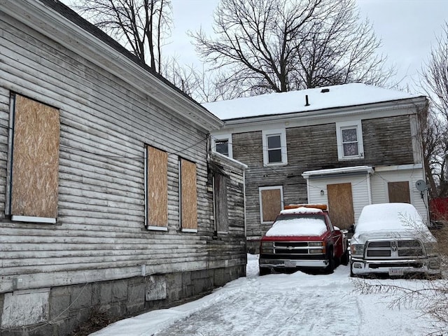 view of snow covered property