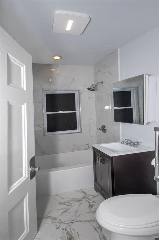 bathroom with shower / bathtub combination, toilet, marble finish floor, and vanity