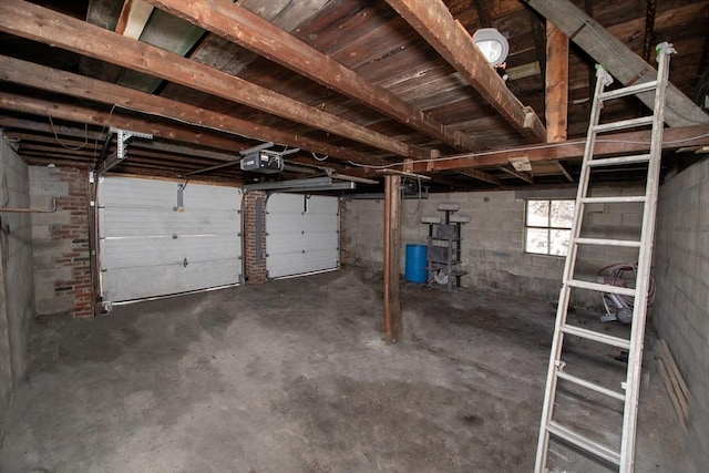 garage featuring concrete block wall