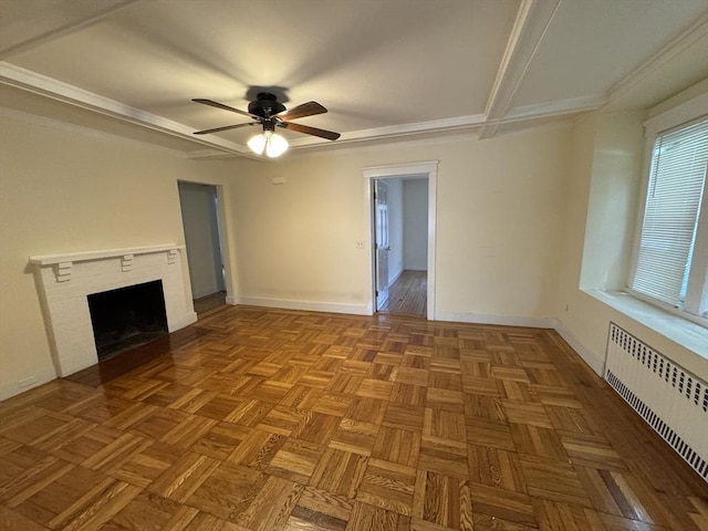 589-591 Washington St, Brookline, MA 02446 - unfurnished living room with radiator, ceiling fan, a brick fireplace, and baseboards