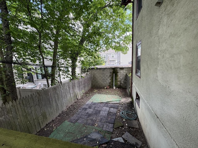 589-591 Washington St, Brookline, MA 02446 - view of patio with a fenced backyard