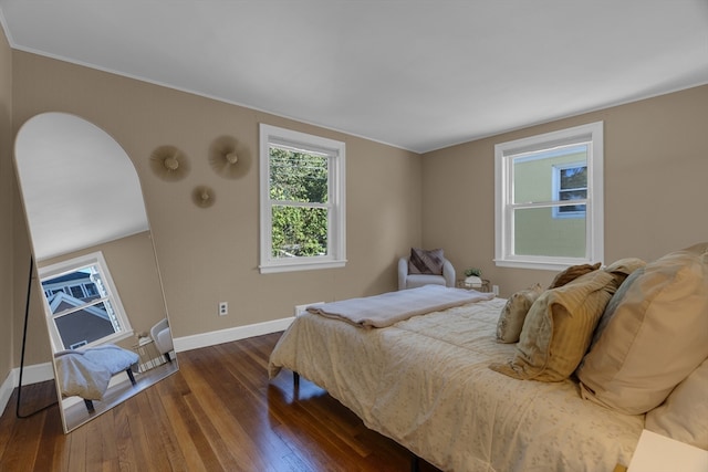 bedroom featuring dark hardwood / wood-style floors