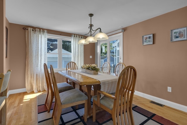 dining room featuring light wood-type flooring