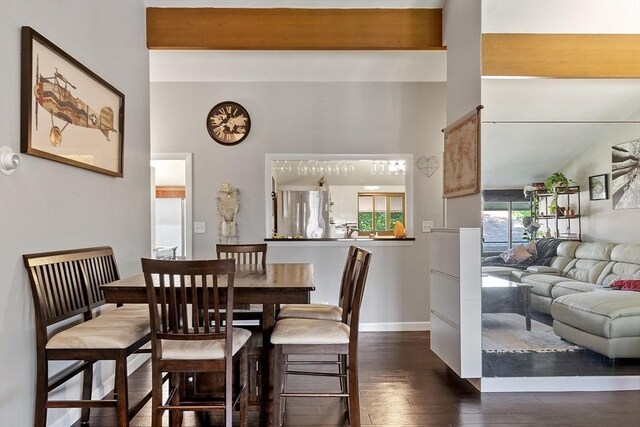 7 Longwood Dr Unit 212, Andover, MA 01810 - dining room with dark wood finished floors and baseboards
