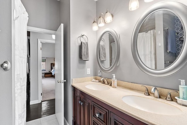 7 Longwood Dr Unit 212, Andover, MA 01810 - ensuite bathroom with double vanity and tile patterned floors