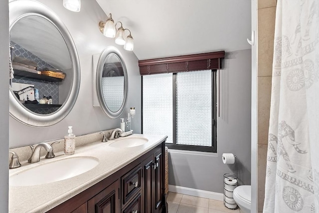 7 Longwood Dr Unit 212, Andover, MA 01810 - full bathroom with tile patterned flooring, double vanity, toilet, and baseboards