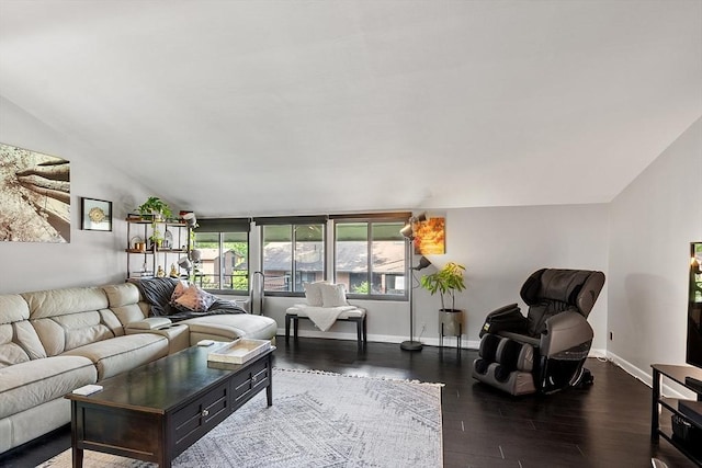 7 Longwood Dr Unit 212, Andover, MA 01810 - living area featuring dark wood finished floors, baseboards, and lofted ceiling