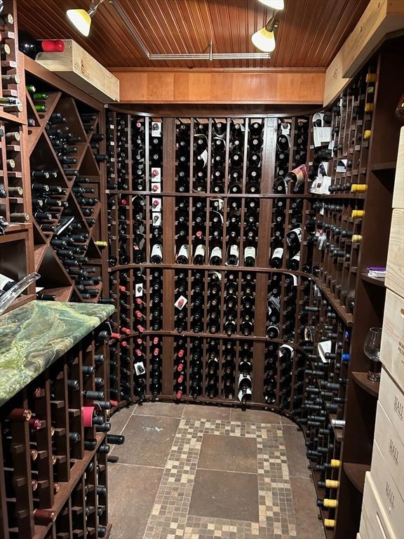 wine room with wooden ceiling