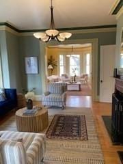 living room featuring ornamental molding