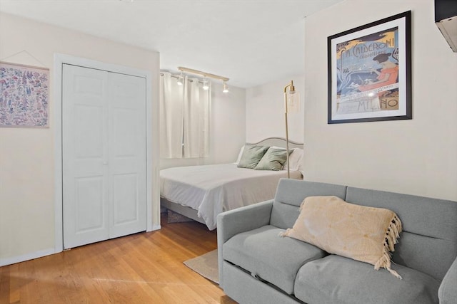 bedroom featuring light wood-type flooring