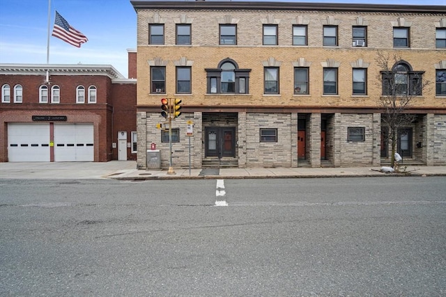 view of building exterior featuring a garage