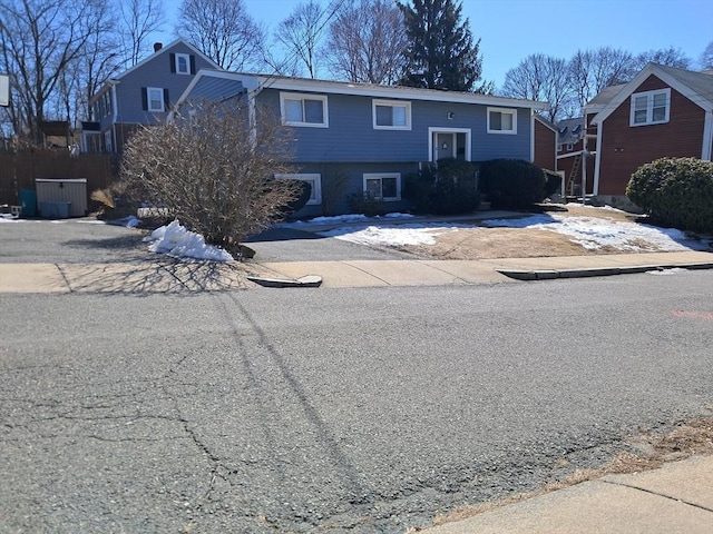 bi-level home with concrete driveway