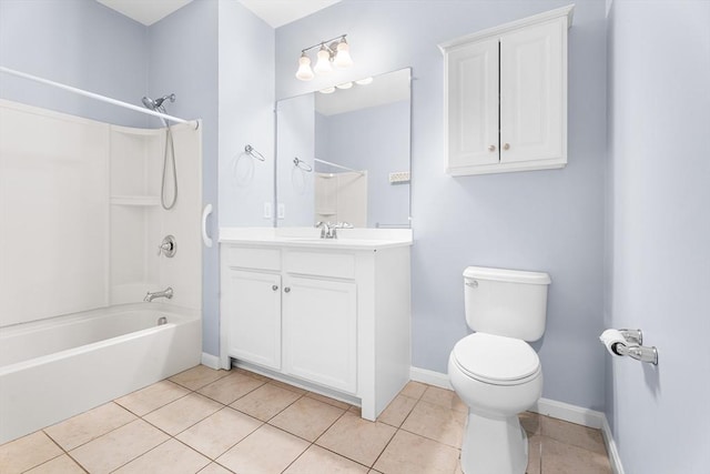 bathroom with tile patterned floors, toilet, bathing tub / shower combination, and vanity