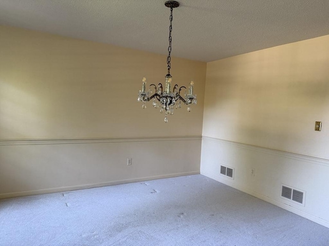 6 J William Hts, Millis, MA 02054 - carpeted spare room with a chandelier and a textured ceiling