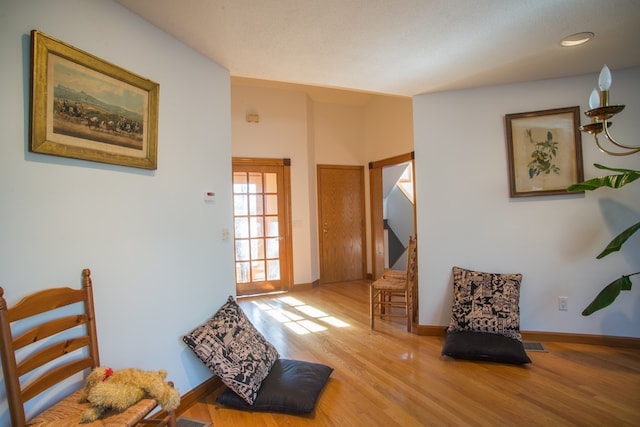 sitting room featuring light wood-type flooring