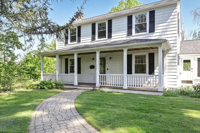 2 Silverwood Ter, South Hadley, MA 01075 - view of front facade featuring a porch, a front lawn, and a shingled roof